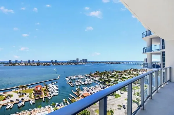 a view of a balcony with an ocean view