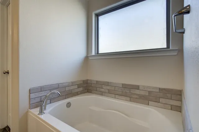 a bathroom with a bathtub