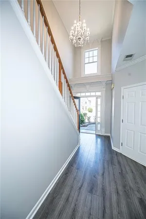 a view of gallery with wooden floor