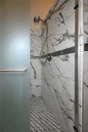 a bathroom with a sink double vanity and a mirror