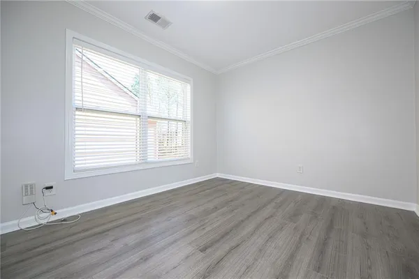 a spacious bathroom with a double vanity sink toilet and a shower