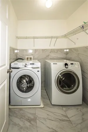 a view of a garden with a bench in a garden