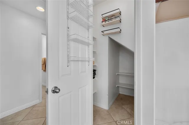 a bathroom with a shower and a sink