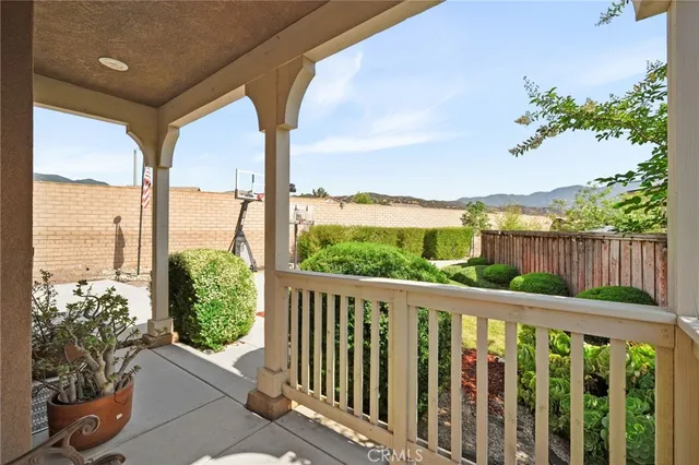 a view of a porch with a big yard