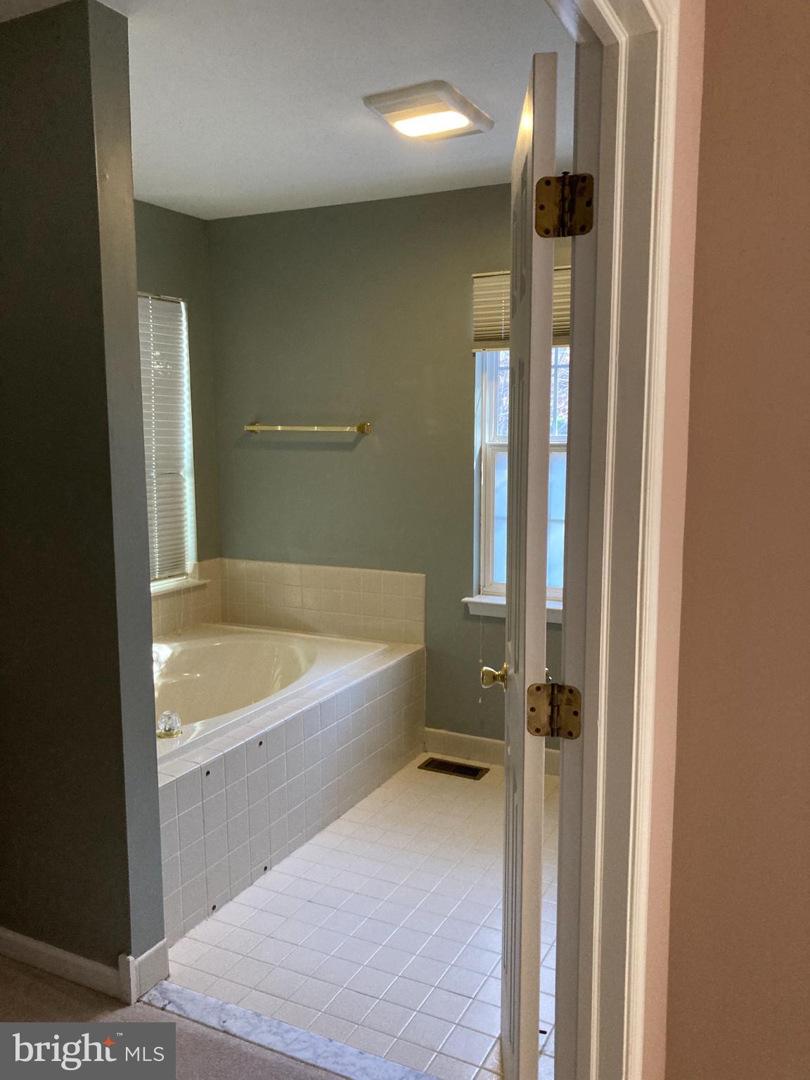 1458 Broad Run Road Landenberg, PA 19350 - Photo 18 of 34 a bathroom with a tub and shower