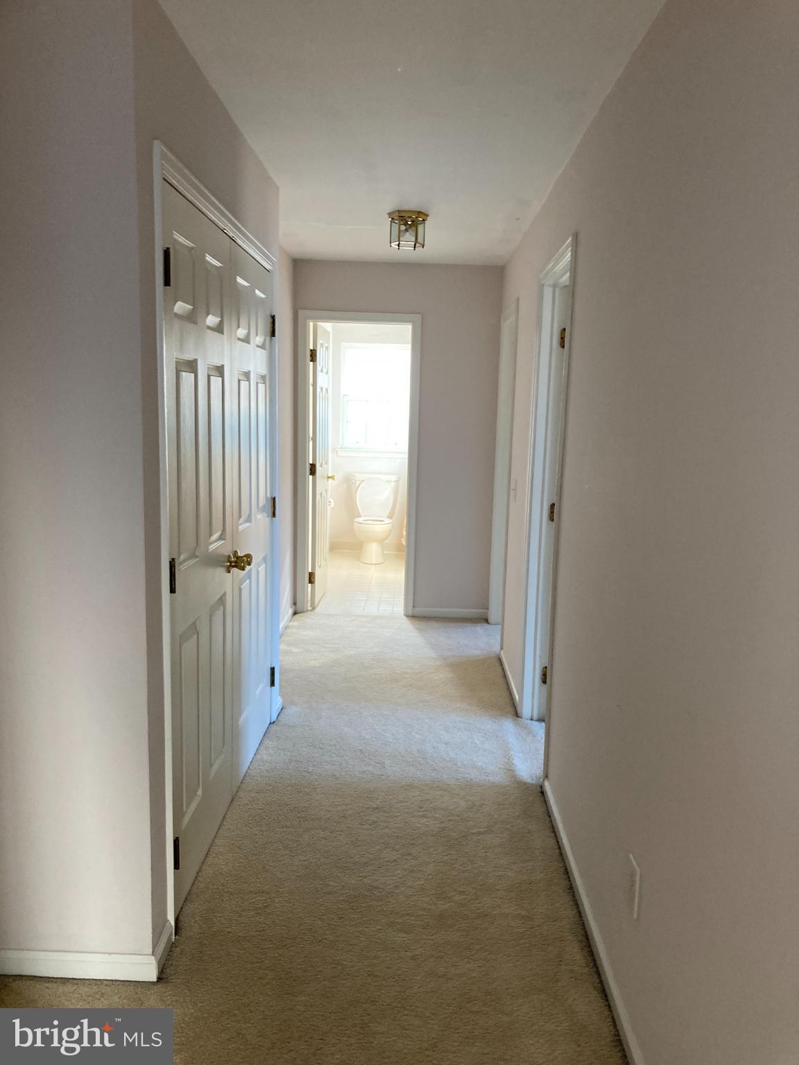 1458 Broad Run Road Landenberg, PA 19350 - Photo 23 of 34 a view of a hallway with wooden shelves
