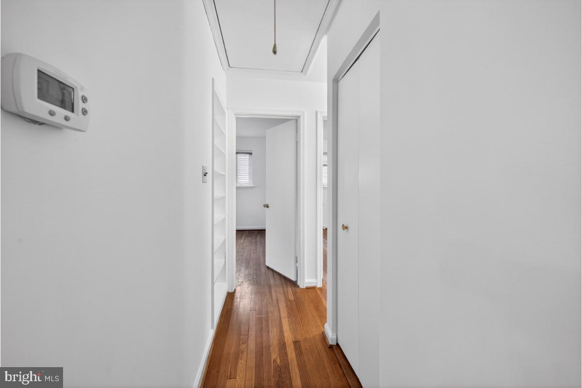 4068 Adams Drive Silver Spring, MD 20902 - Photo 11 of 43 a view of a hallway with wooden floor