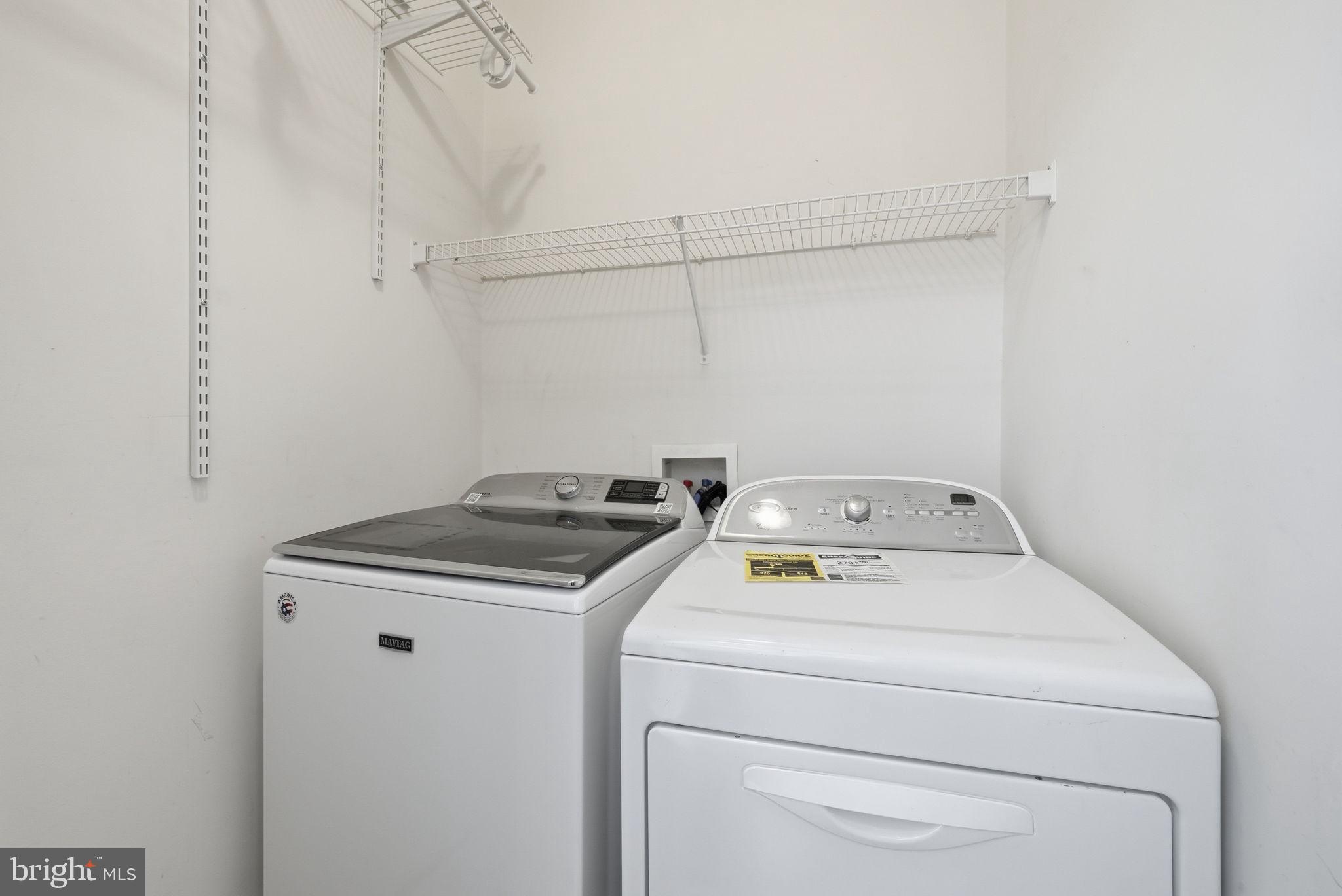 6800 Innesfree Way Gainesville, VA 20155 - Photo 18 of 32 a utility room with dryer and washer