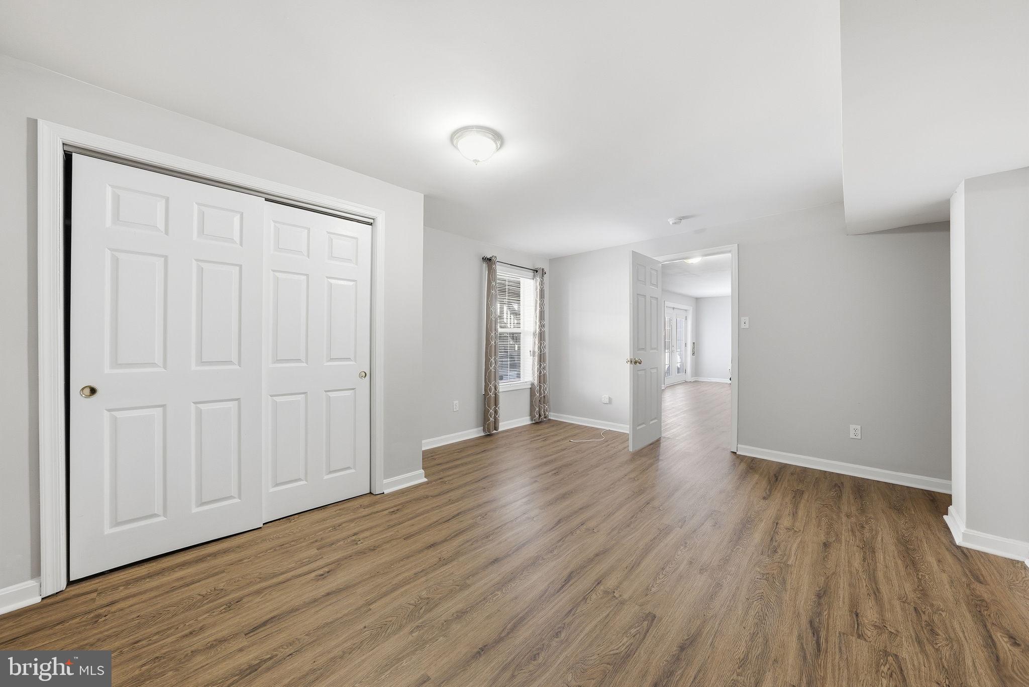 6800 Innesfree Way Gainesville, VA 20155 - Photo 30 of 32 a view of empty room with wooden floor