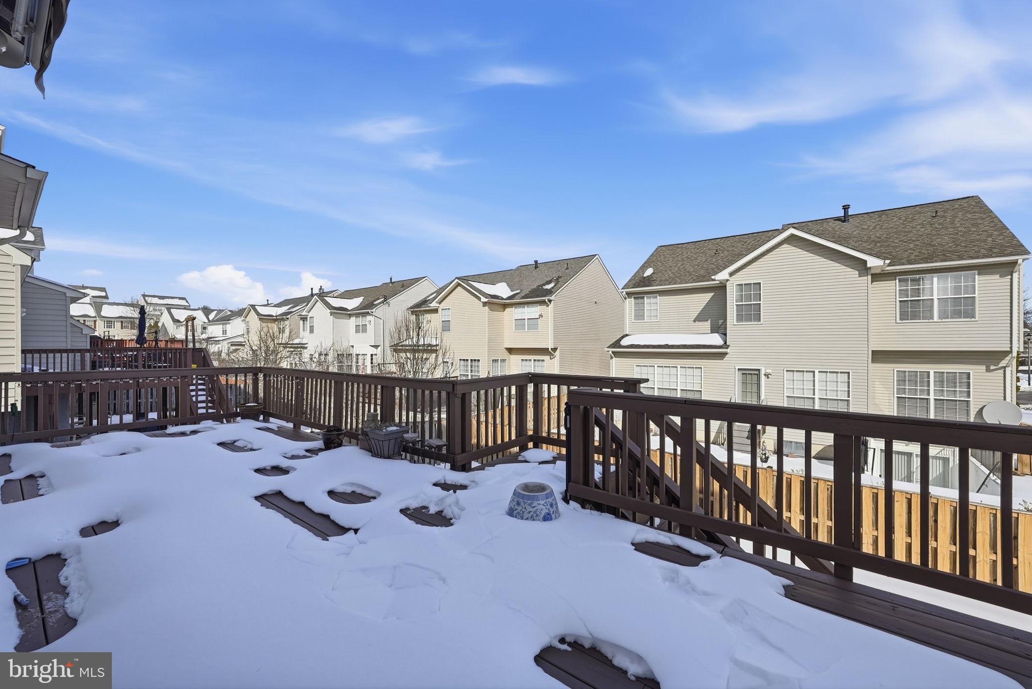 6800 Innesfree Way Gainesville, VA 20155 - Photo 31 of 32 a view of a balcony with a barbeque