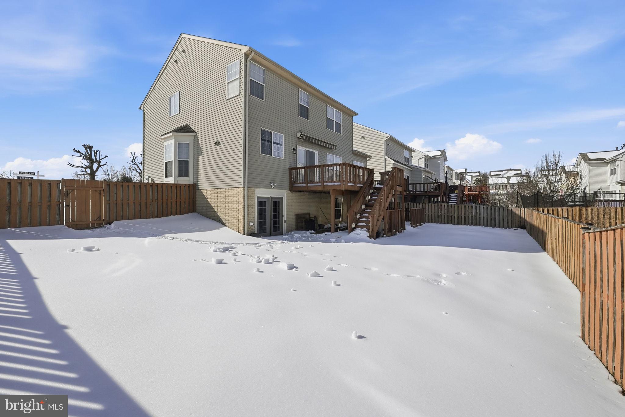 6800 Innesfree Way Gainesville, VA 20155 - Photo 32 of 32 a view of roof deck with a barbeque