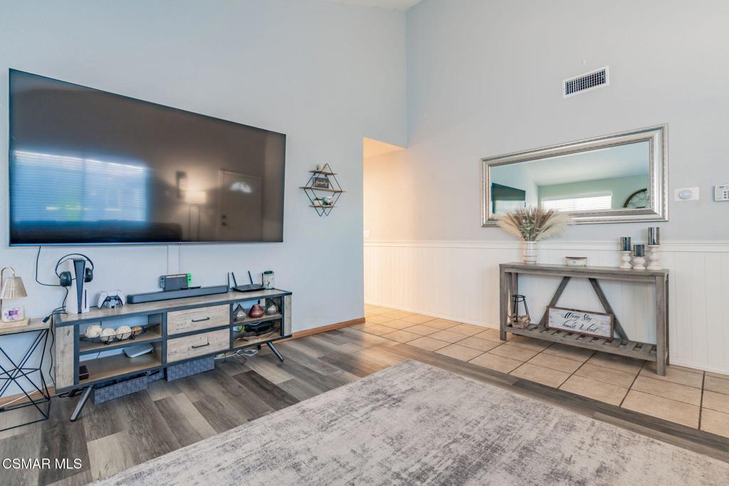 1816 Hillary Court Simi Valley, CA 93065 - Photo 11 of 58 a living room with furniture and a flat screen tv