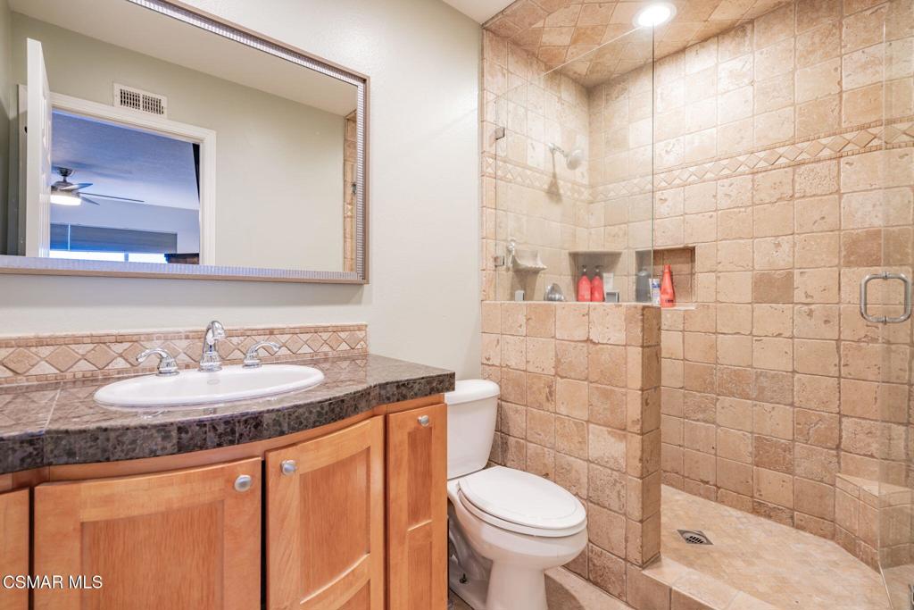 1816 Hillary Court Simi Valley, CA 93065 - Photo 30 of 58 a bathroom with a sink a toilet and shower