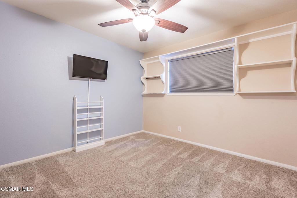 1816 Hillary Court Simi Valley, CA 93065 - Photo 36 of 58 a view of room with stairs and a ceiling fan