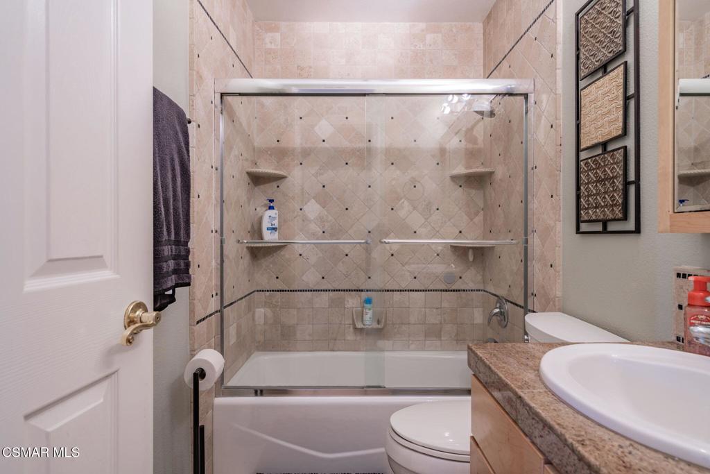 1816 Hillary Court Simi Valley, CA 93065 - Photo 40 of 58 a bathroom with a sink toilet and shower