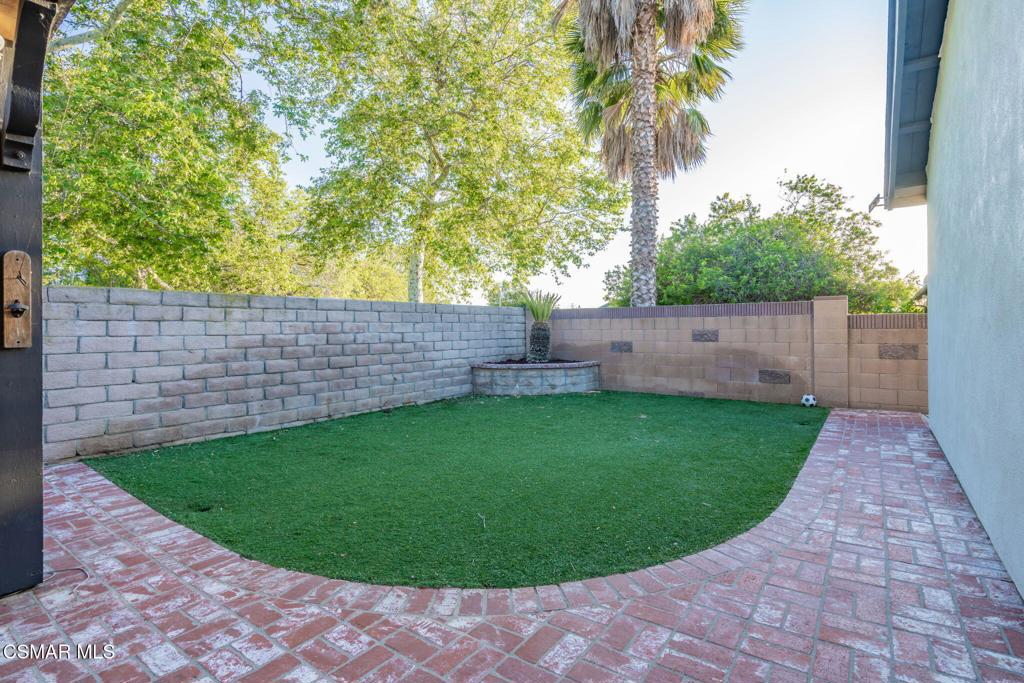 1816 Hillary Court Simi Valley, CA 93065 - Photo 48 of 58 a view of a backyard with a small cabin