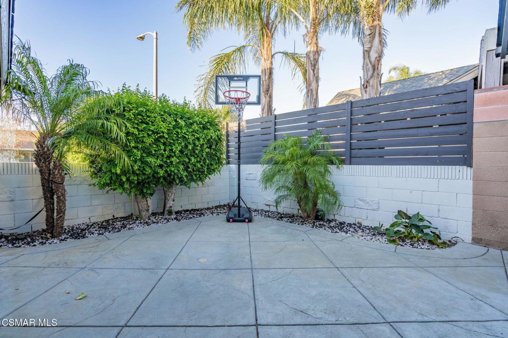 1816 Hillary Court Simi Valley, CA 93065 - Photo 49 of 58 a couple of palm trees sitting in front of a building