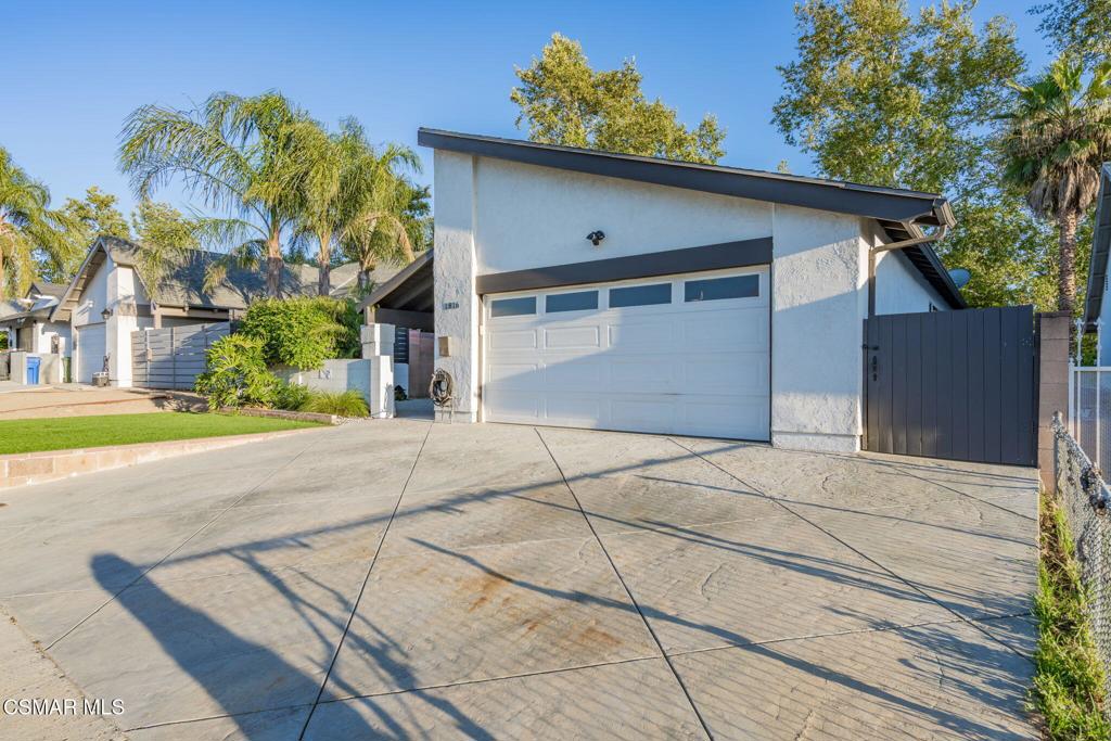 1816 Hillary Court Simi Valley, CA 93065 - Photo 52 of 58 a backyard of a house with plants and trees