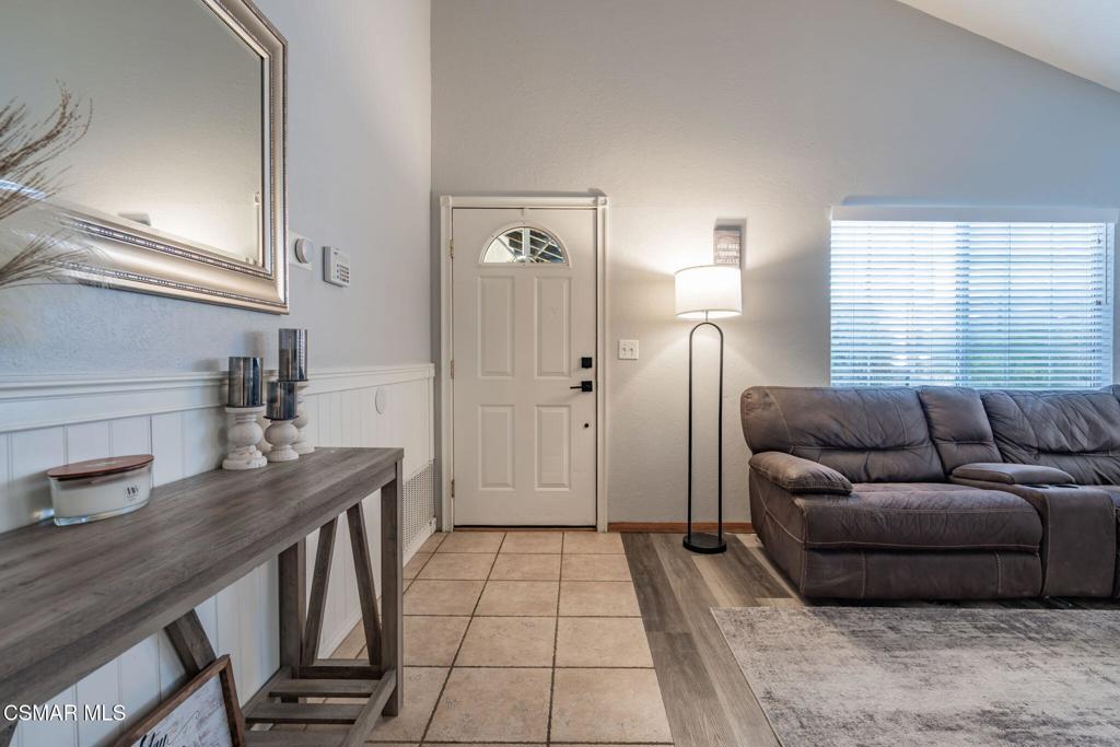 1816 Hillary Court Simi Valley, CA 93065 - Photo 6 of 58 a living room with furniture and a table