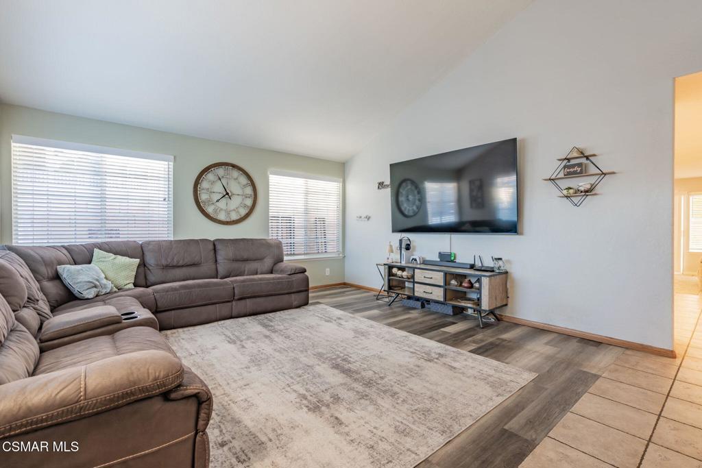 1816 Hillary Court Simi Valley, CA 93065 - Photo 7 of 58 a living room with furniture and a flat screen tv