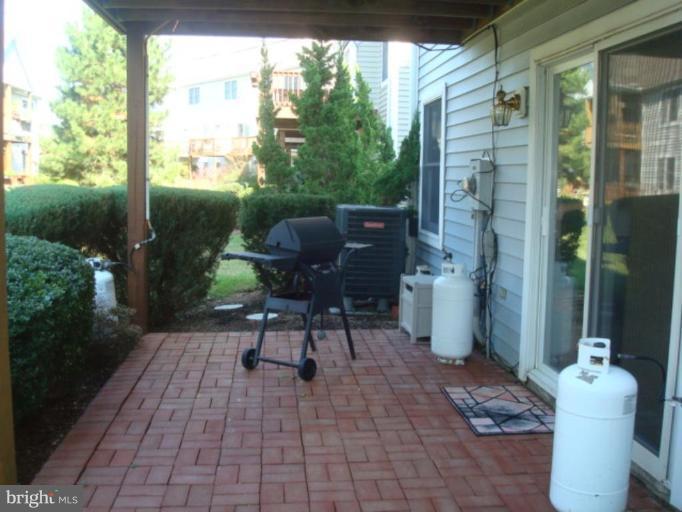 210 Blenny Lane, Unit 101 Chester, MD 21619 - Photo 10 of 30 Patio