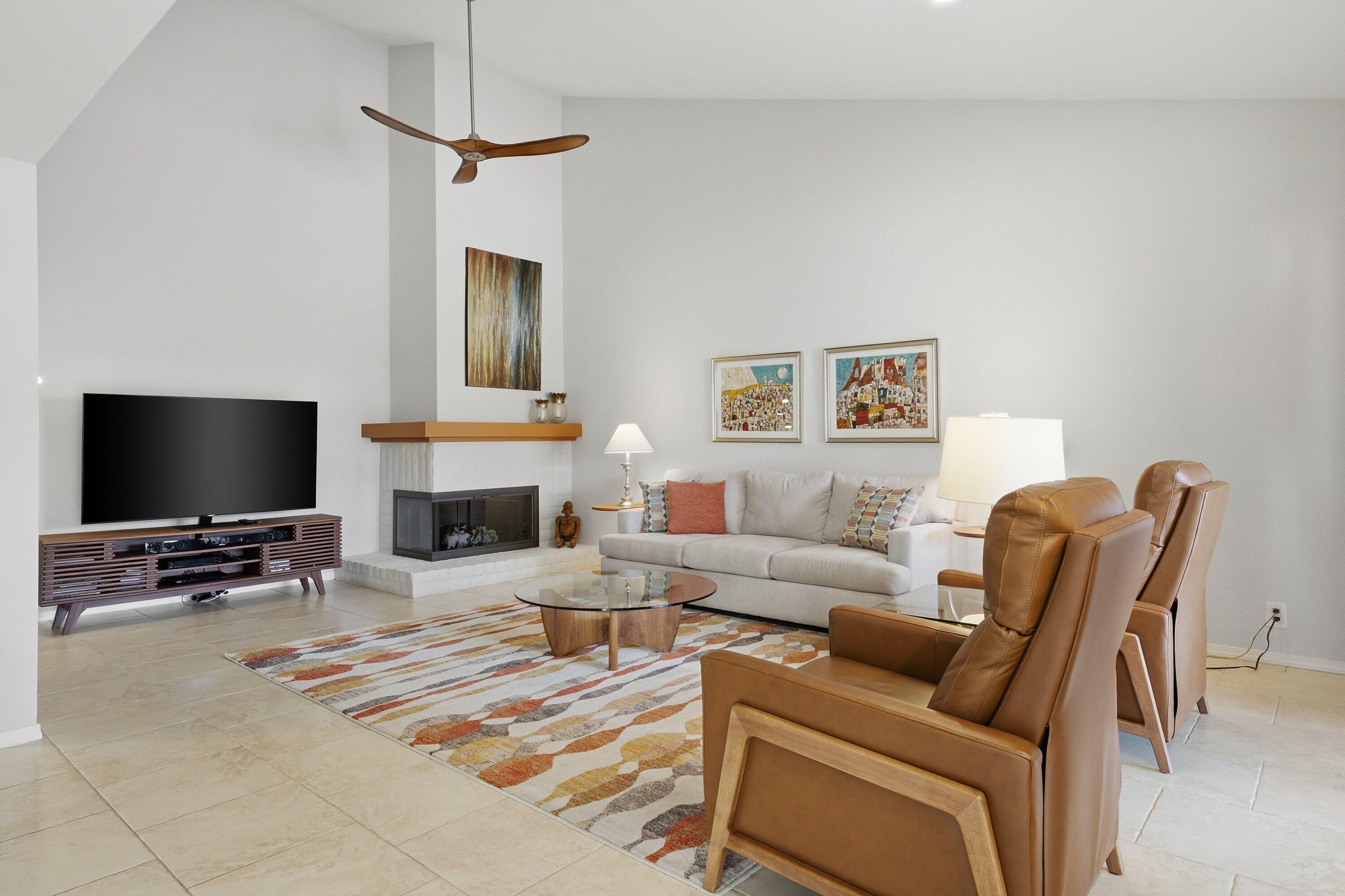 19 Maximo Way Palm Desert, CA 92260 - Photo 5 of 20 a living room with furniture and a flat screen tv