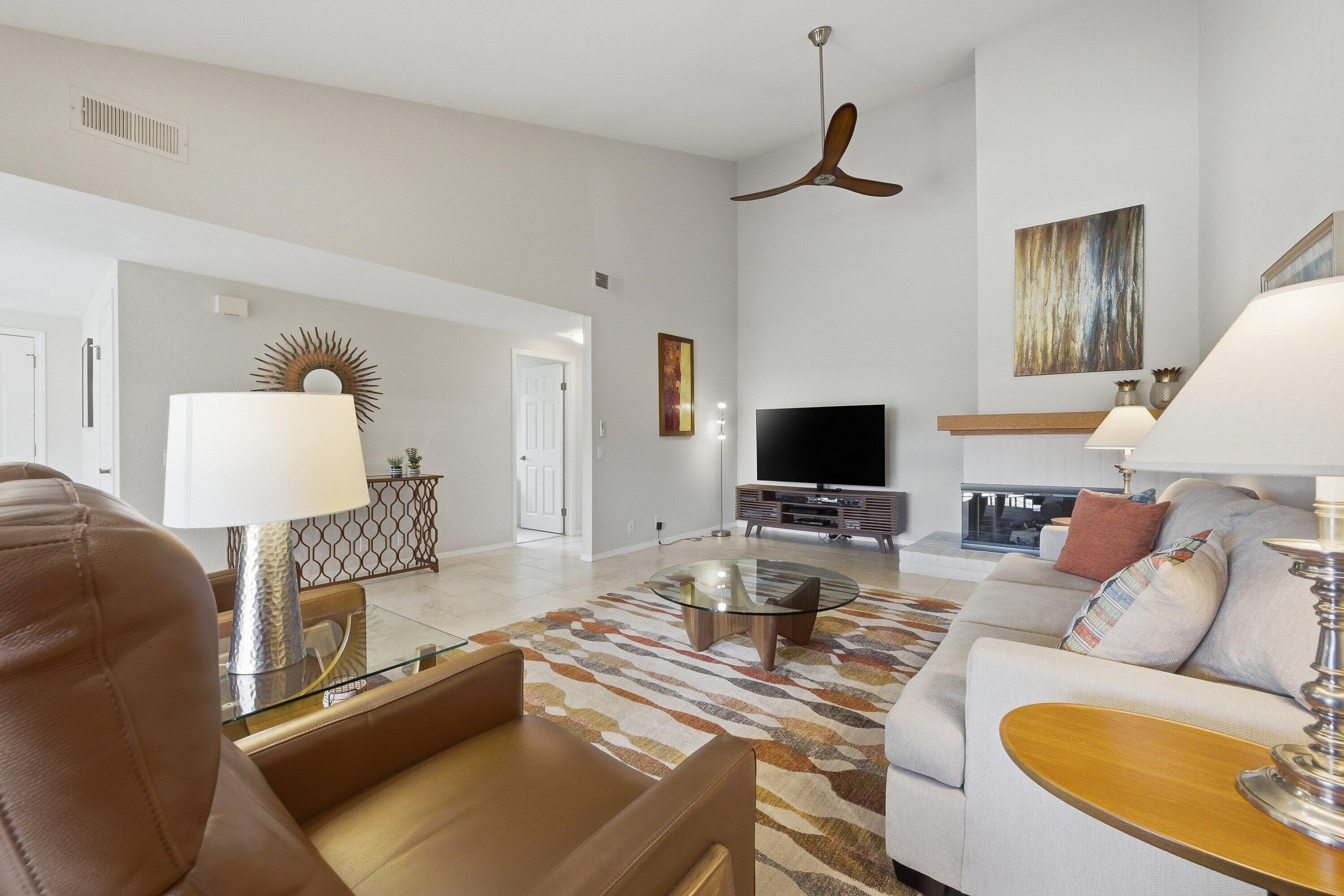 19 Maximo Way Palm Desert, CA 92260 - Photo 6 of 20 a living room with furniture and a flat screen tv