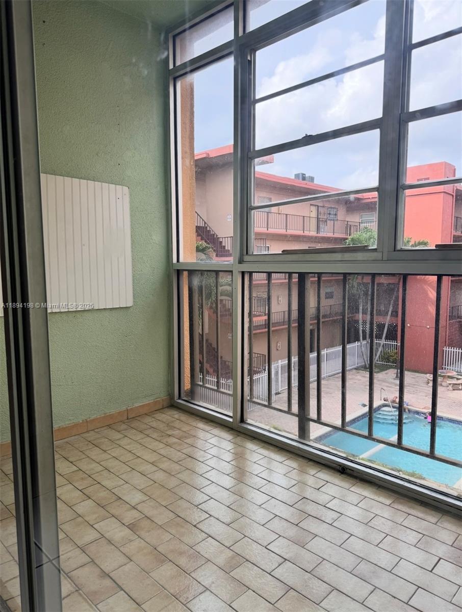 6055 West 19th Avenue, Unit 304 Hialeah, FL 33012 - Photo 12 of 24 a view of a balcony