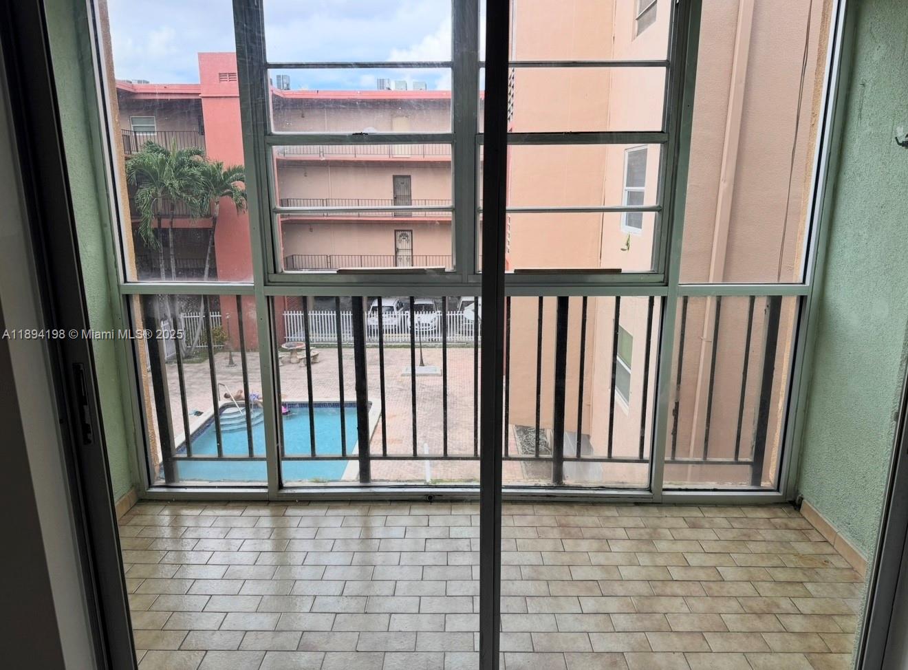 6055 West 19th Avenue, Unit 304 Hialeah, FL 33012 - Photo 13 of 24 a view of a balcony