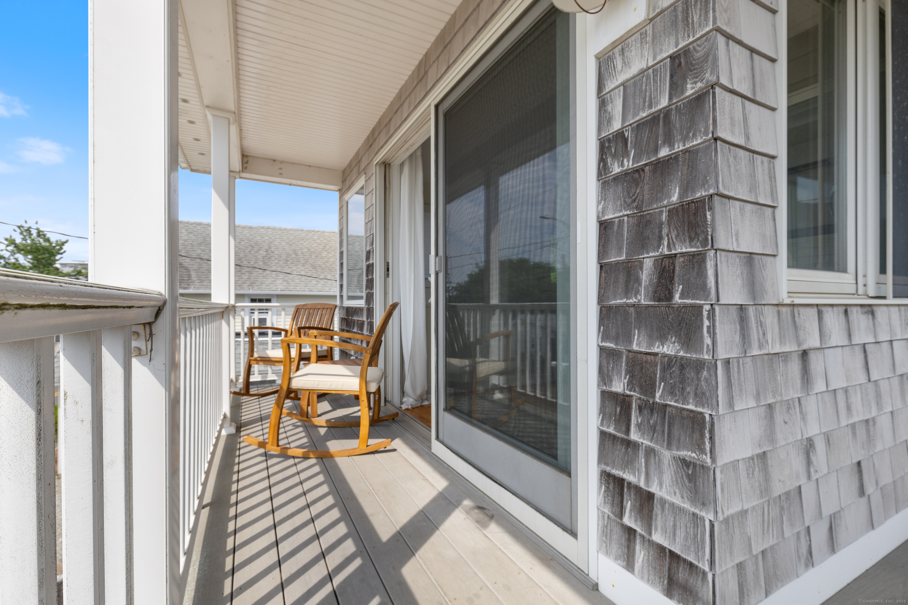 176 Shore Road Clinton, CT 06413 - Photo 10 of 40 a view of balcony with couch