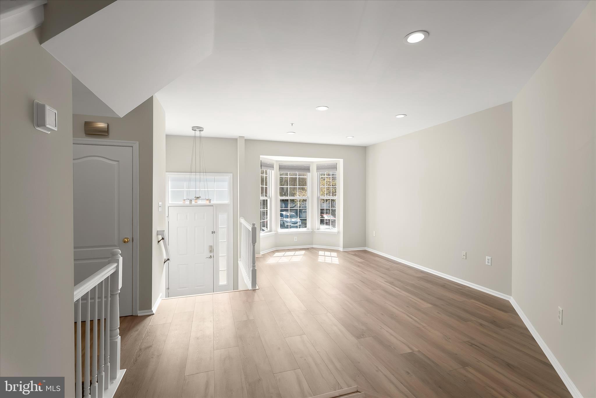 2631 Cameron Way Frederick, MD 21701 - Photo 20 of 86 wooden floor in an empty room with a window