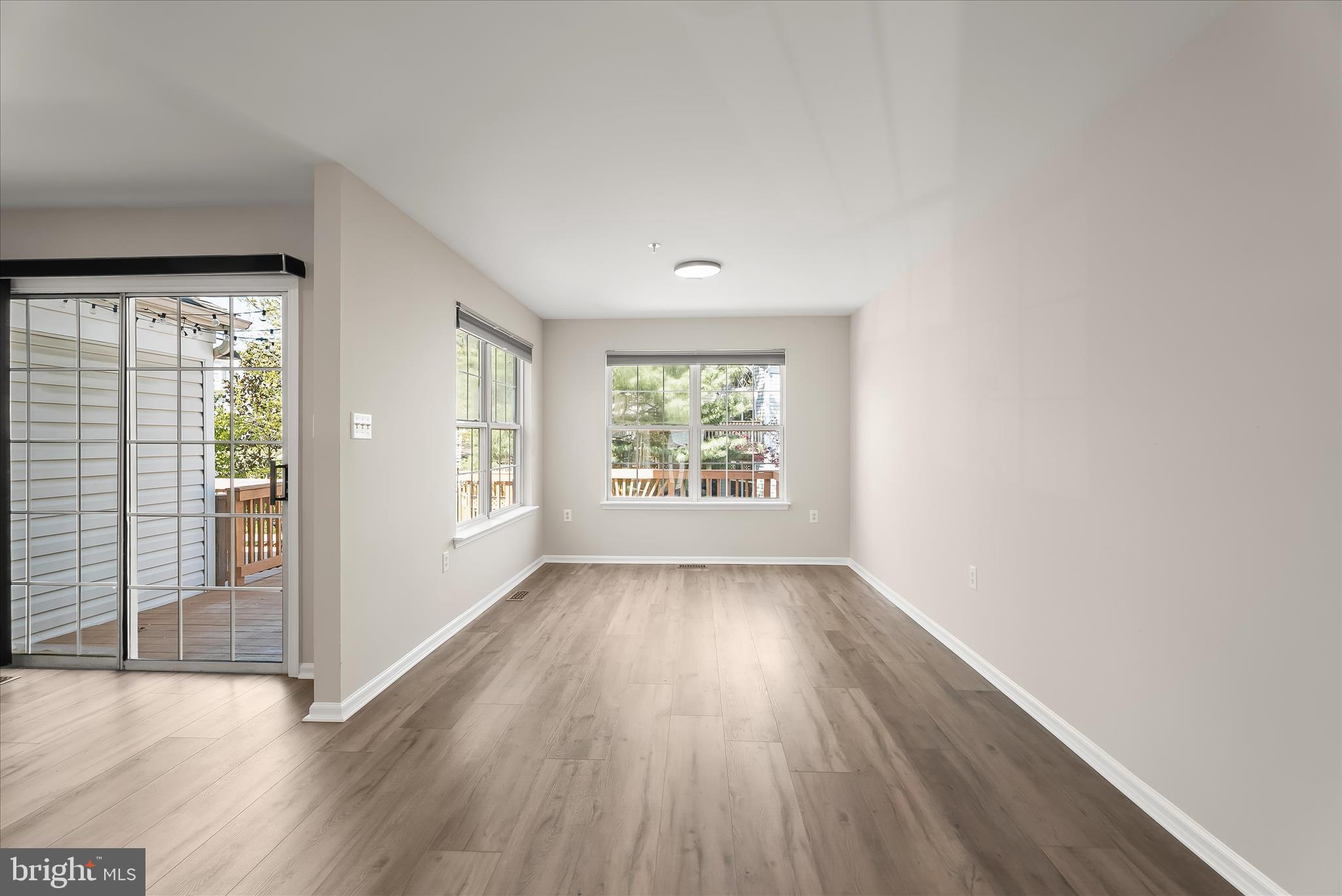 2631 Cameron Way Frederick, MD 21701 - Photo 25 of 86 an empty room with wooden floor and windows