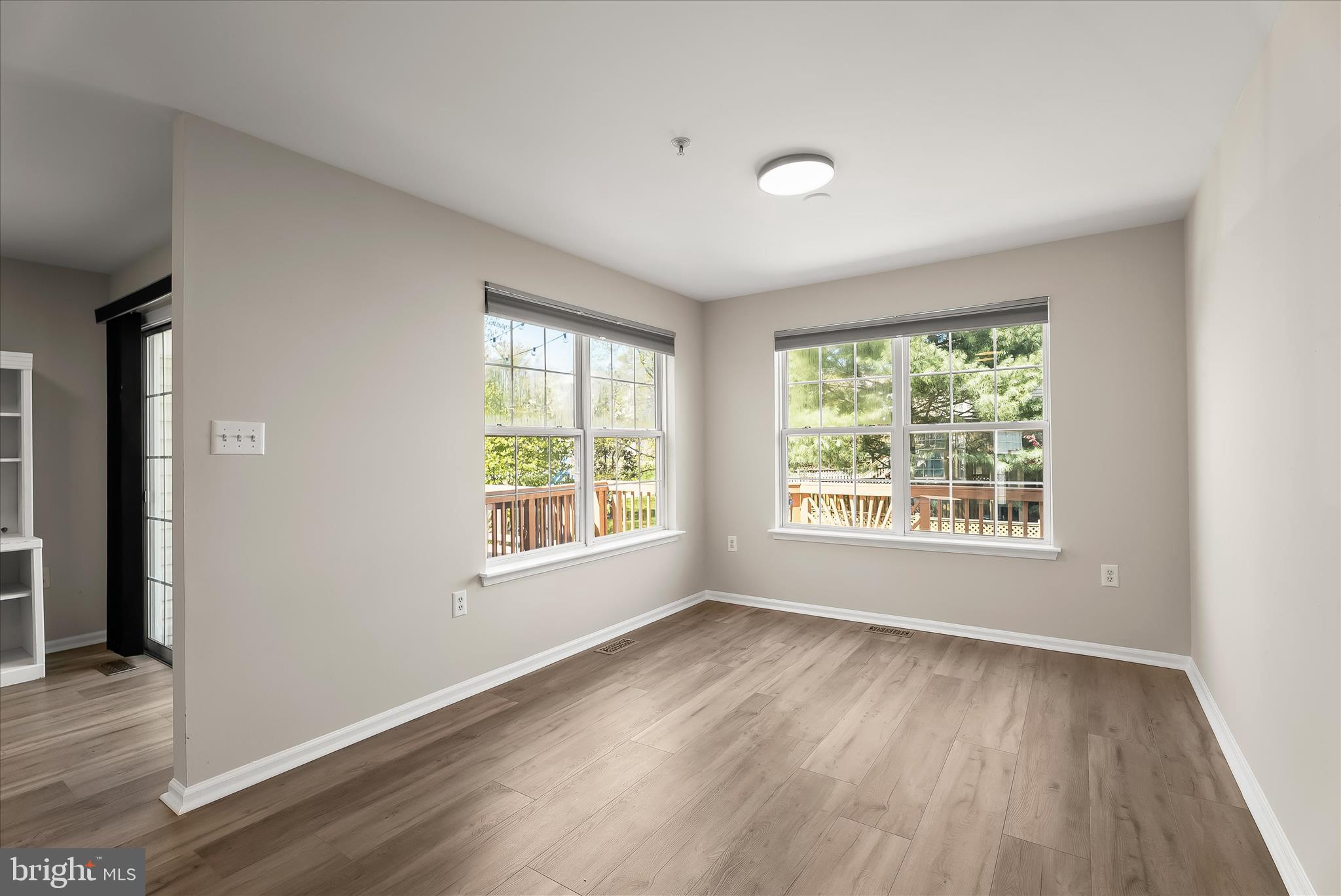 2631 Cameron Way Frederick, MD 21701 - Photo 27 of 86 a view of an empty room with wooden floor and a window