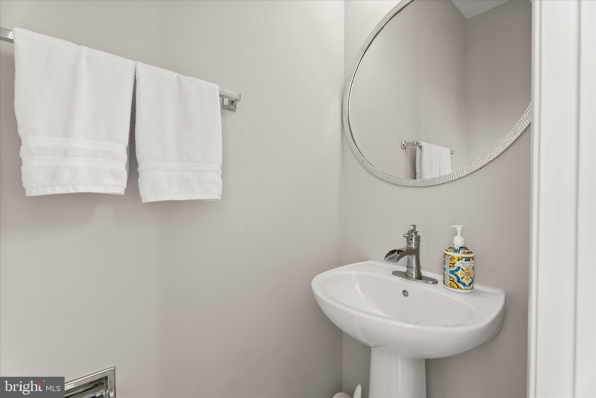 2631 Cameron Way Frederick, MD 21701 - Photo 33 of 86 a bathroom with a sink a mirror and a shower