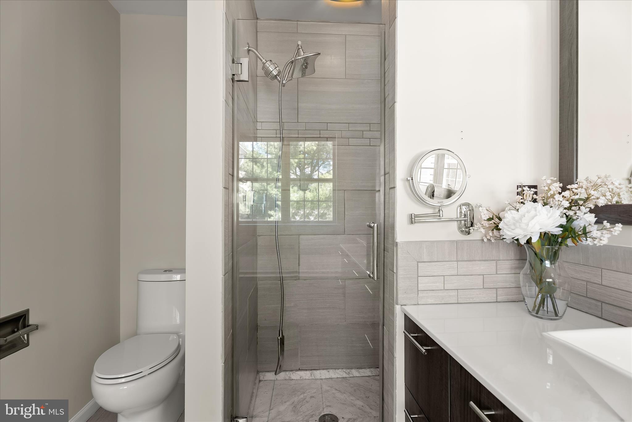 2631 Cameron Way Frederick, MD 21701 - Photo 41 of 86 a bathroom with a sink a toilet and shower