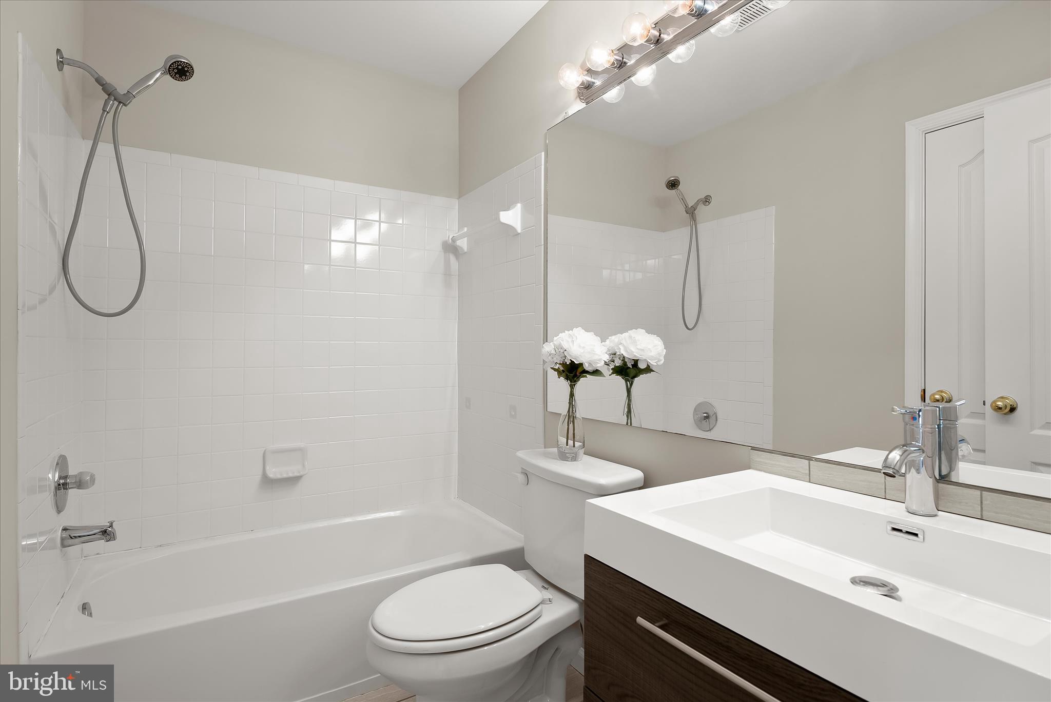 2631 Cameron Way Frederick, MD 21701 - Photo 49 of 86 a bathroom with a sink a toilet and shower