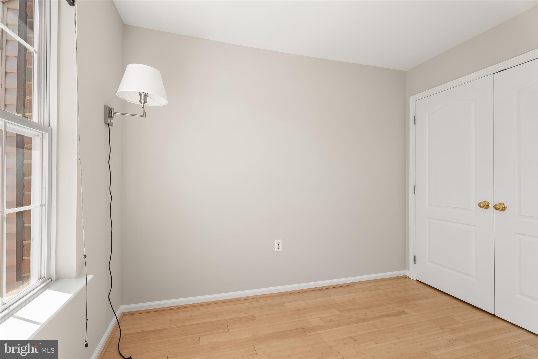 2631 Cameron Way Frederick, MD 21701 - Photo 52 of 86 a view of a room with wooden floor and windows