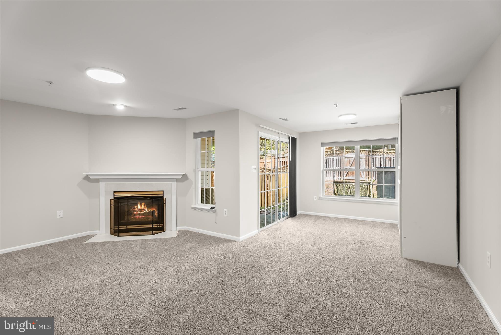 2631 Cameron Way Frederick, MD 21701 - Photo 54 of 86 a view of a livingroom with an empty space and a fireplace