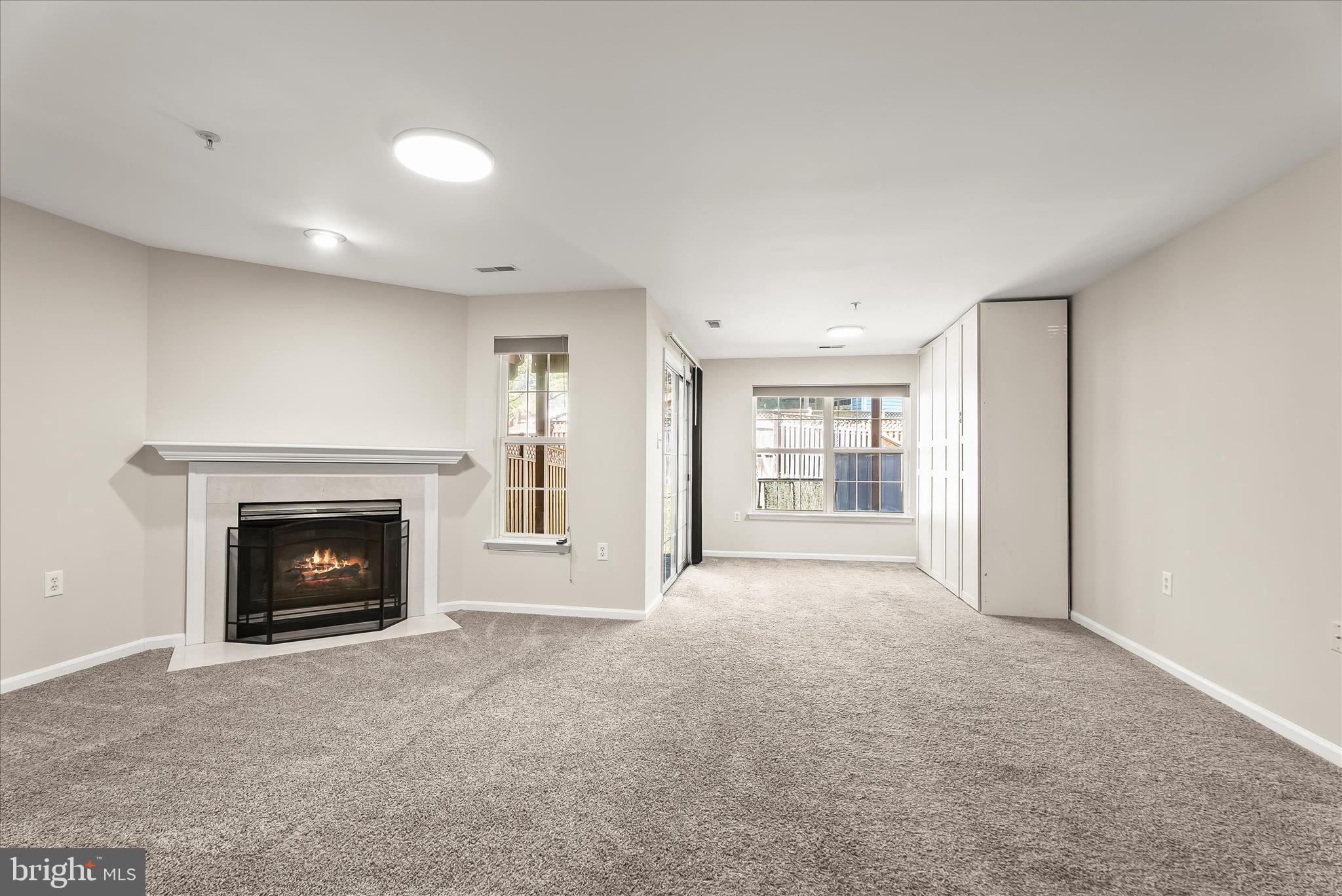 2631 Cameron Way Frederick, MD 21701 - Photo 55 of 86 a view of an empty room with a fireplace and a window