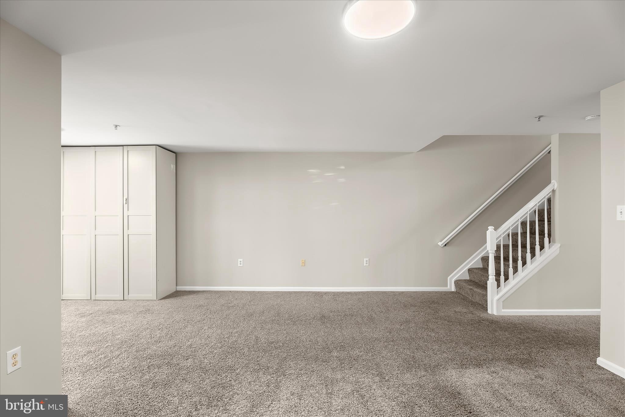 2631 Cameron Way Frederick, MD 21701 - Photo 61 of 86 a view of an empty room with stairs