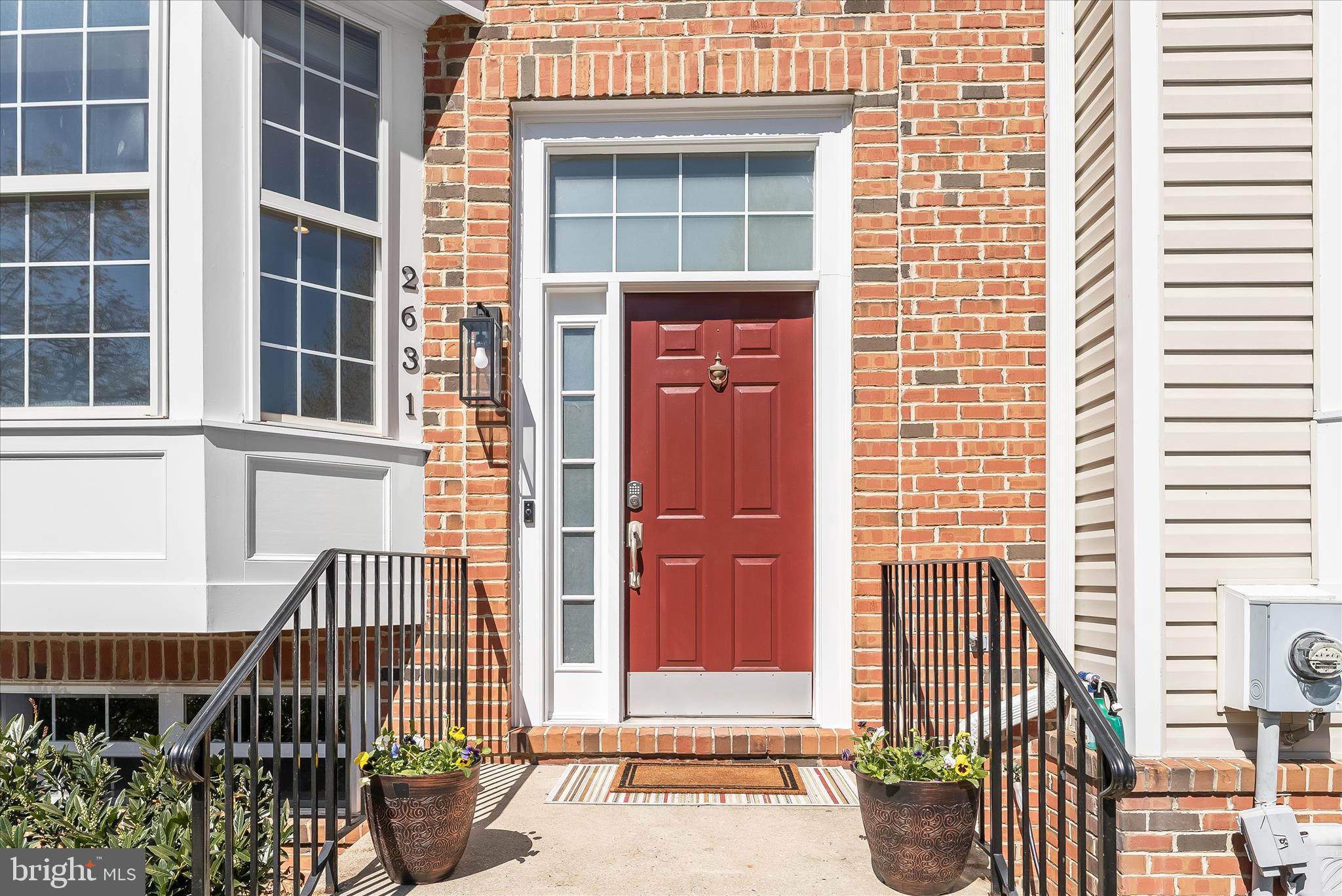 2631 Cameron Way Frederick, MD 21701 - Photo 73 of 86 a front view of a house with a glass door