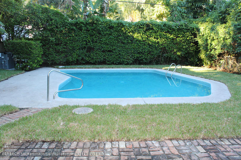 825 Sunset Road West Palm Beach, FL 33401 - Photo 8 of 12 a view of outdoor space yard and swimming pool