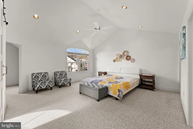 a bed room with a bed and furniture