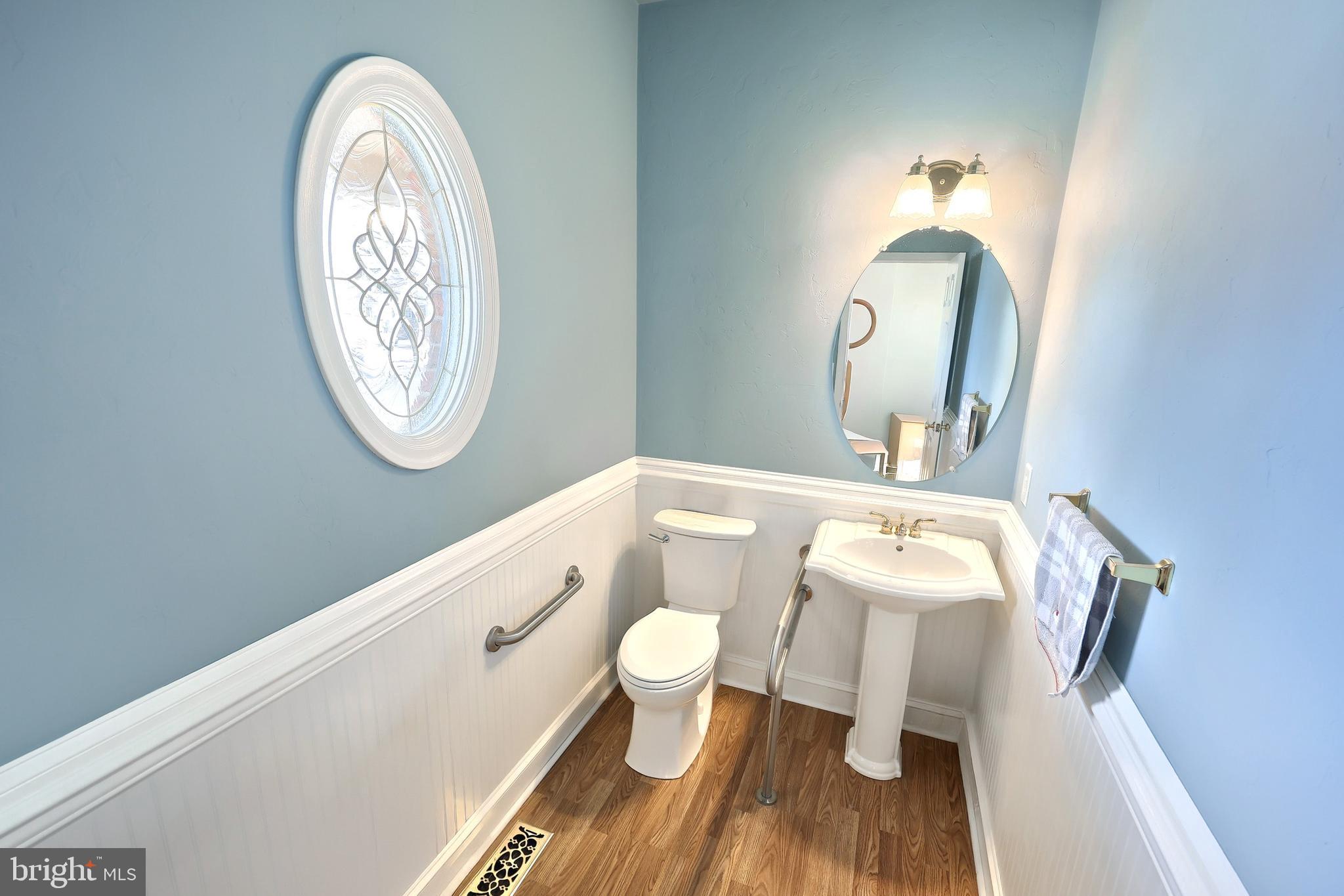 1 Hickory Lane Littlestown, PA 17340 - Photo 12 of 49 a bathroom with a toilet a sink and a mirror