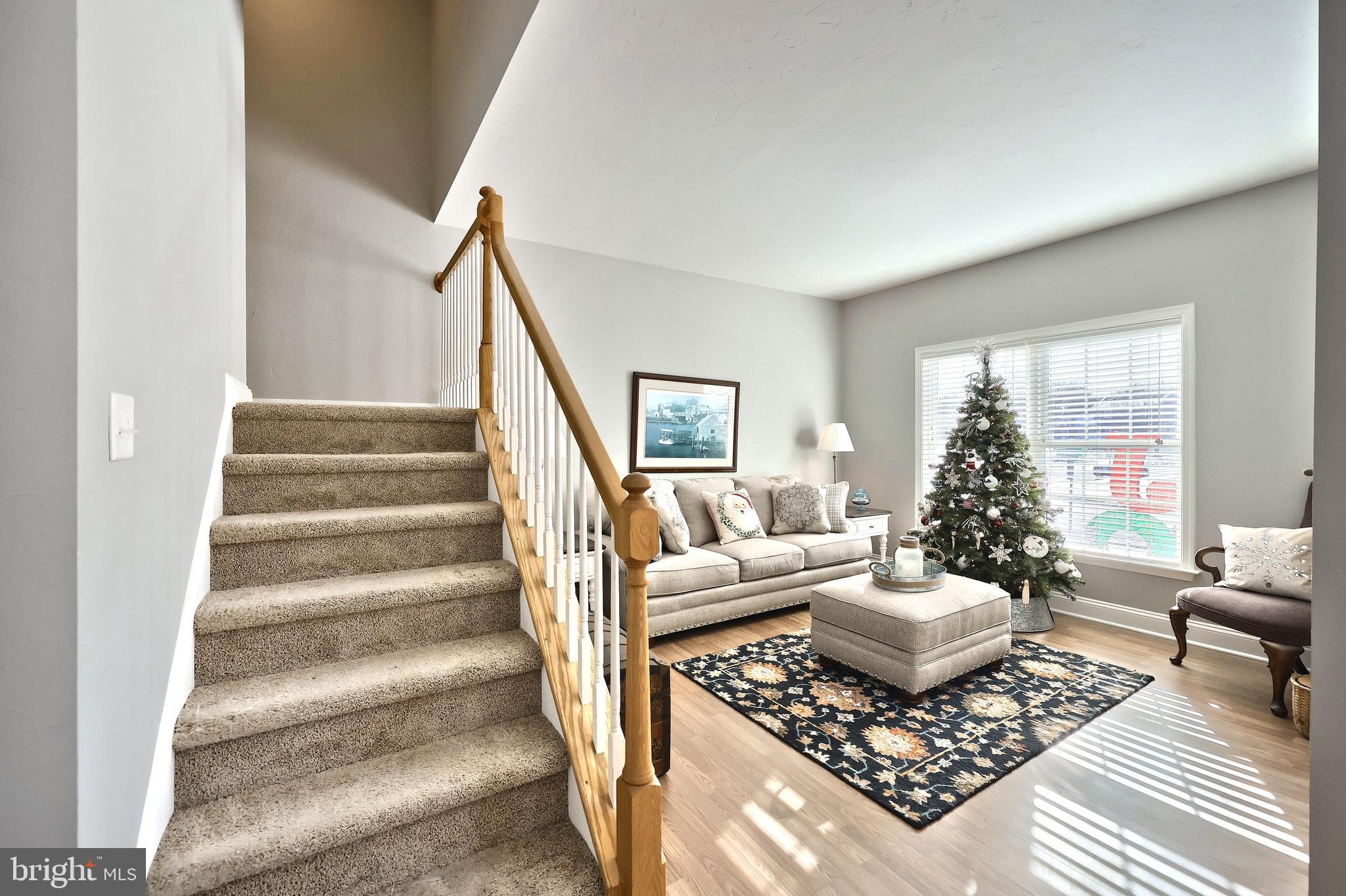1 Hickory Lane Littlestown, PA 17340 - Photo 13 of 49 a living room with furniture and a potted plant