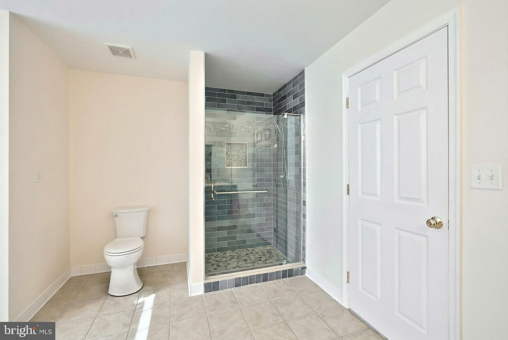 1 Hickory Lane Littlestown, PA 17340 - Photo 18 of 49 a bathroom with a toilet and a shower