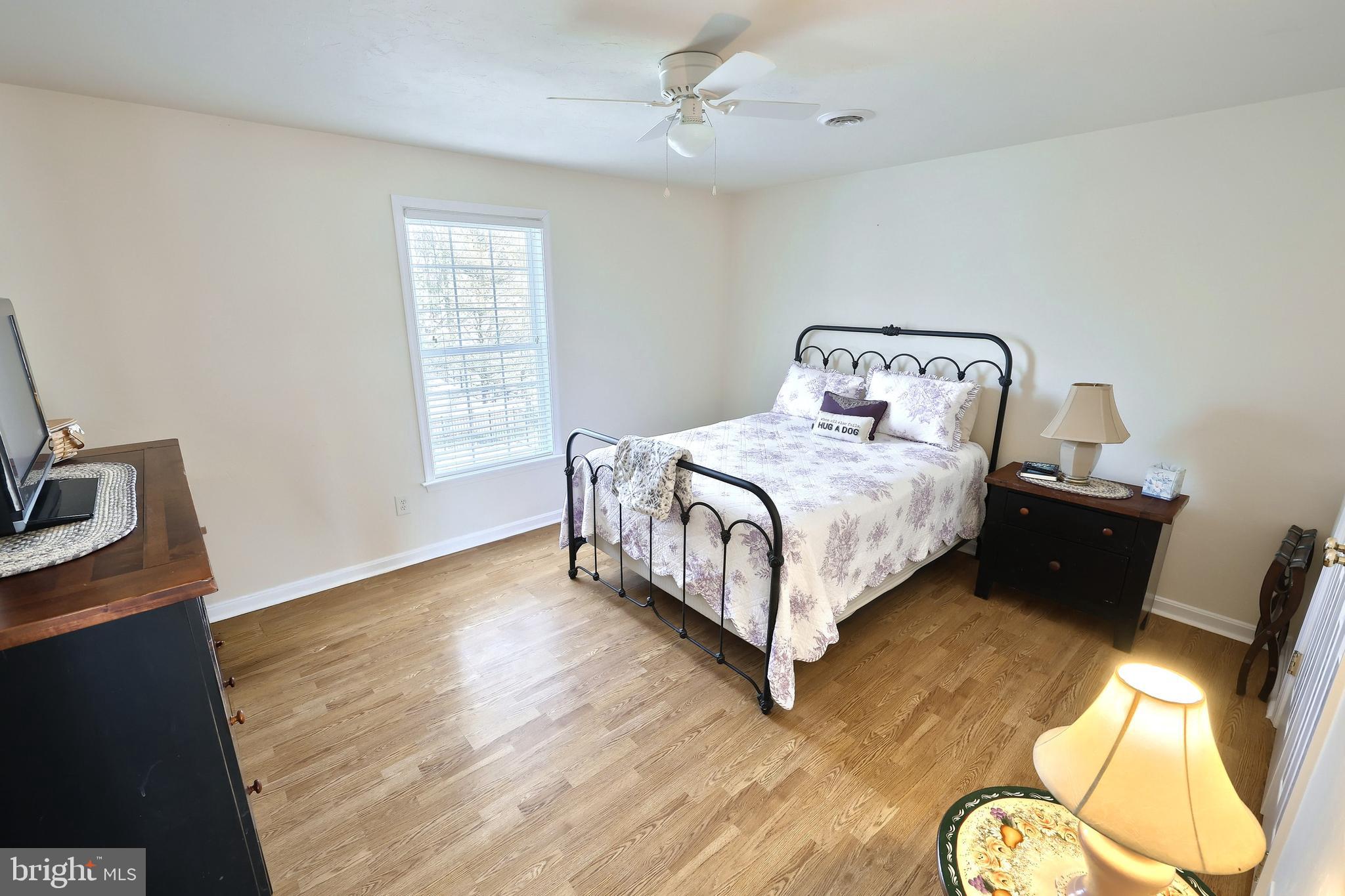 1 Hickory Lane Littlestown, PA 17340 - Photo 23 of 49 a bedroom with a bed dresser and a window