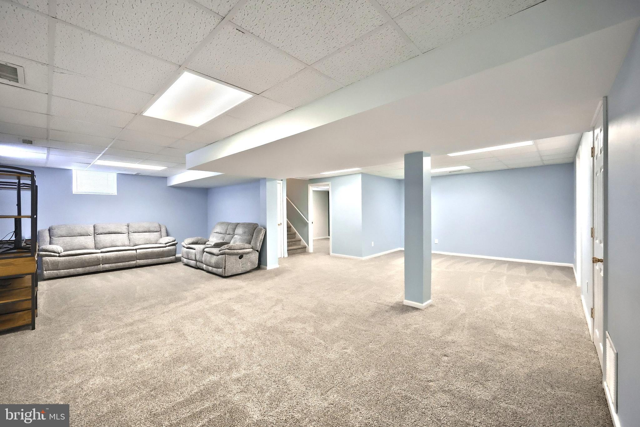 1 Hickory Lane Littlestown, PA 17340 - Photo 25 of 49 a view of a livingroom with furniture and a ceiling fan