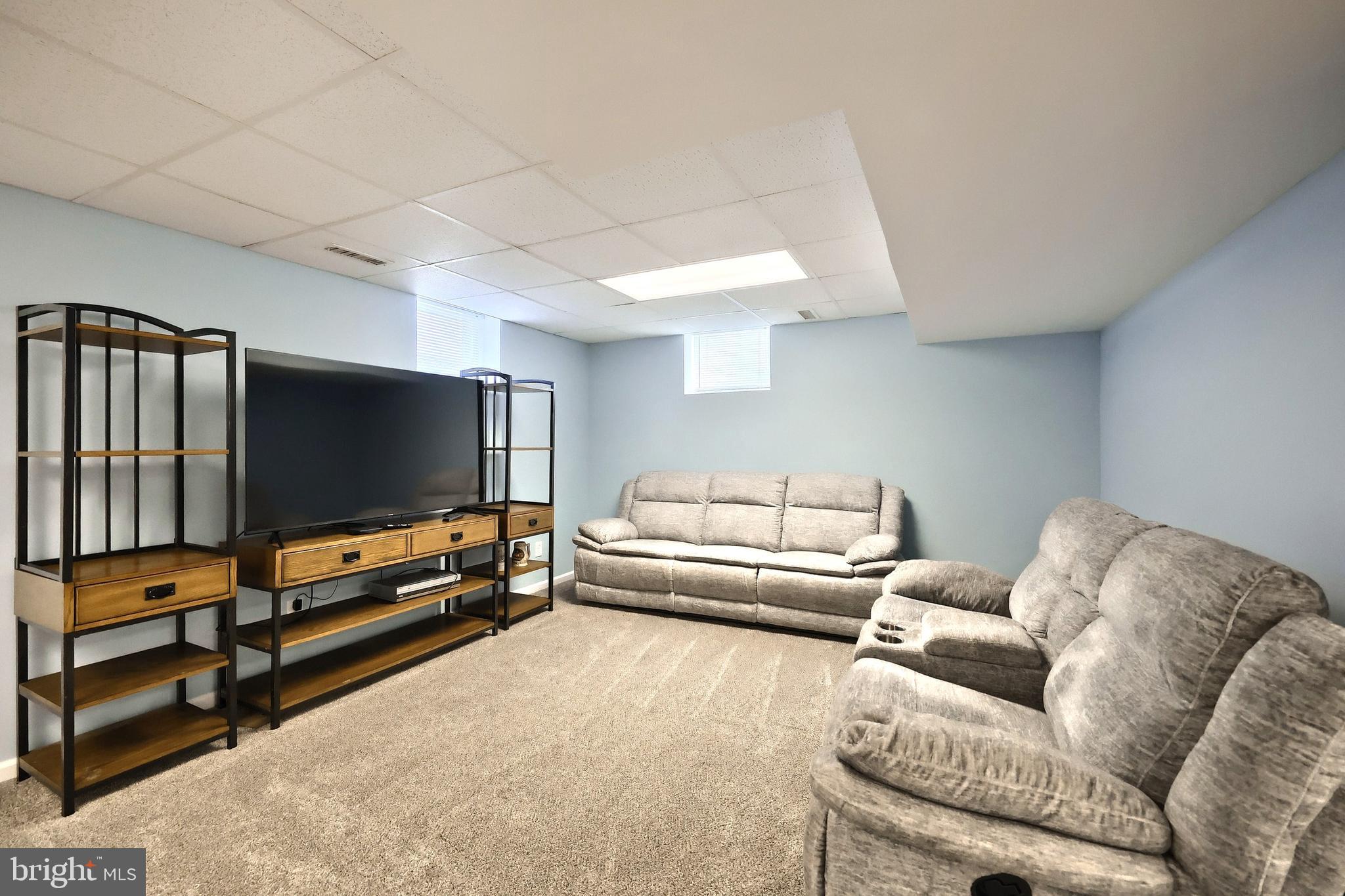 1 Hickory Lane Littlestown, PA 17340 - Photo 29 of 49 a living room with furniture and a flat screen tv