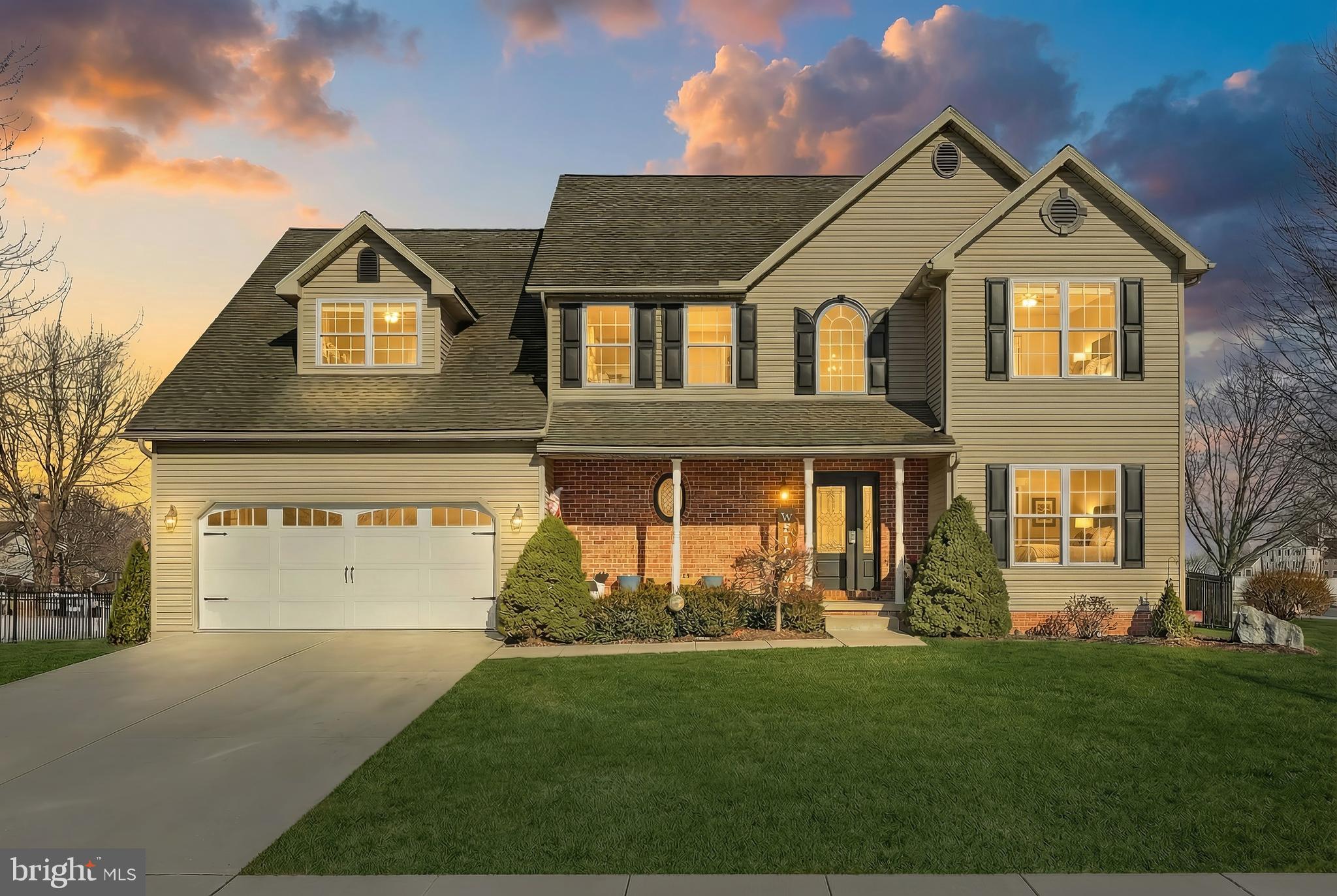1 Hickory Lane Littlestown, PA 17340 - Photo 49 of 49 a front view of a house with a yard and garage